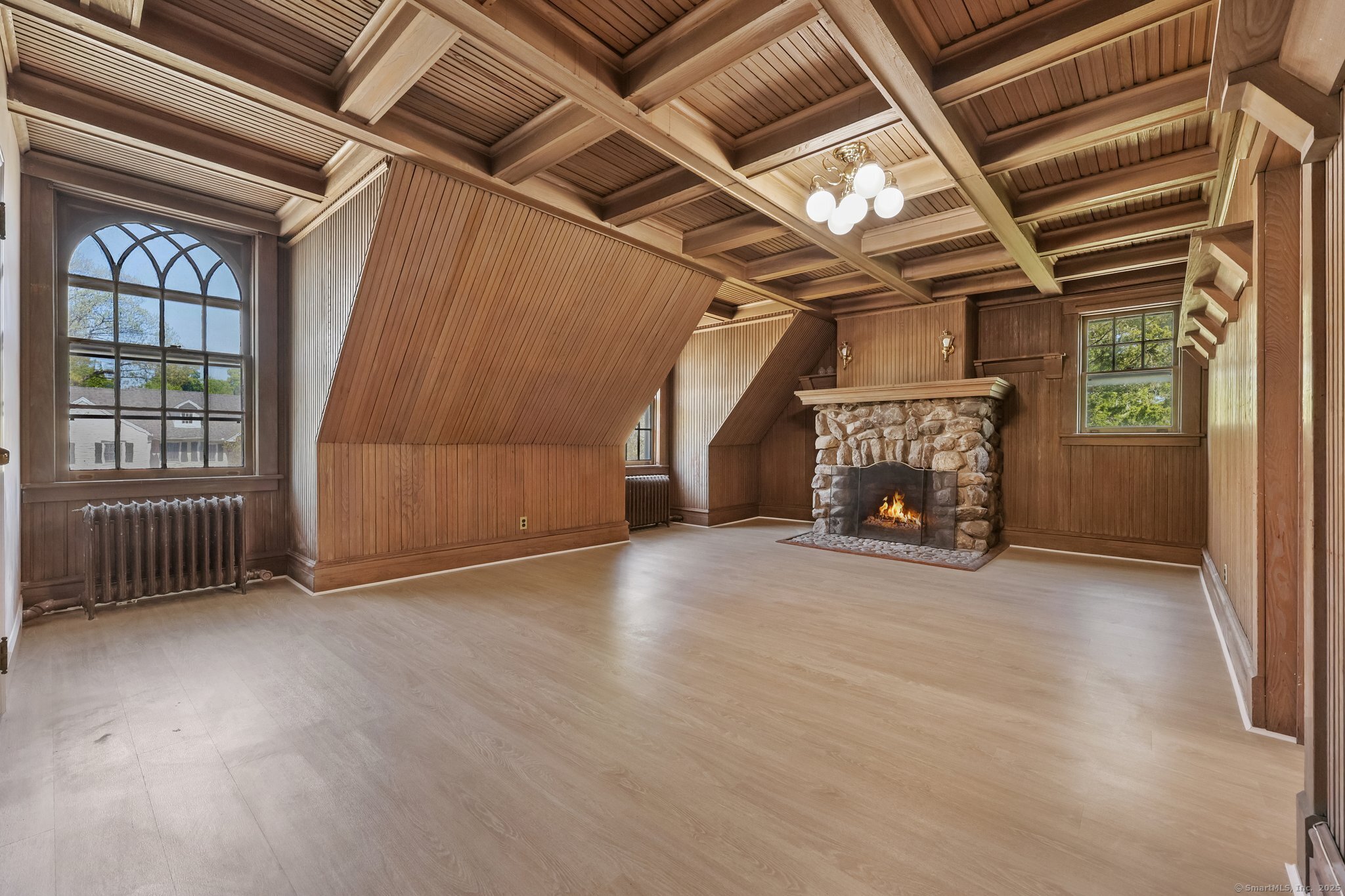 26 Shady Lane Greenwich, CT 06831 - Photo 25 of 29 a view of an empty room with a fireplace