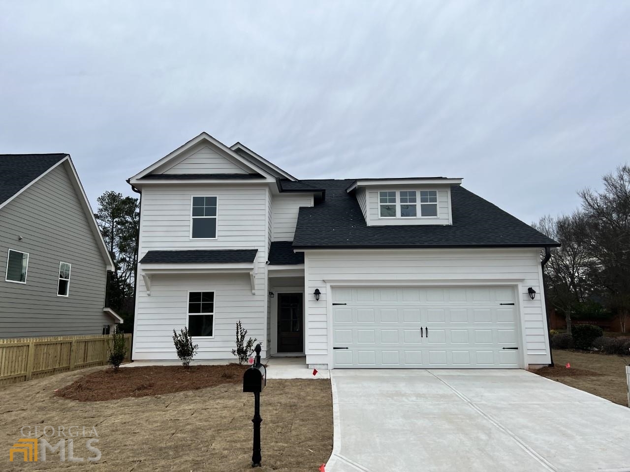 795 Mitchell Bridge Road Athens, GA 30606 - Photo 1 of 1 a front view of a house with garage