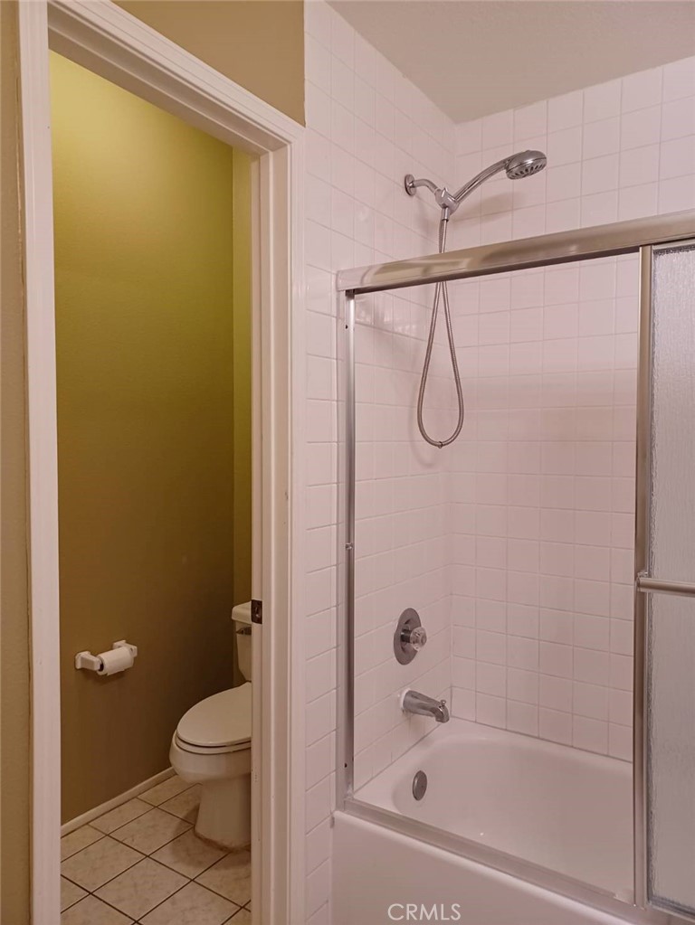 2018 Villa Del Lago Drive, Unit A Chino Hills, CA 91709 - Photo 9 of 10 a bathroom with a shower and a toilet