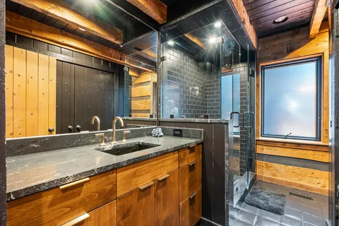 a kitchen with stainless steel appliances granite countertop a stove and a sink