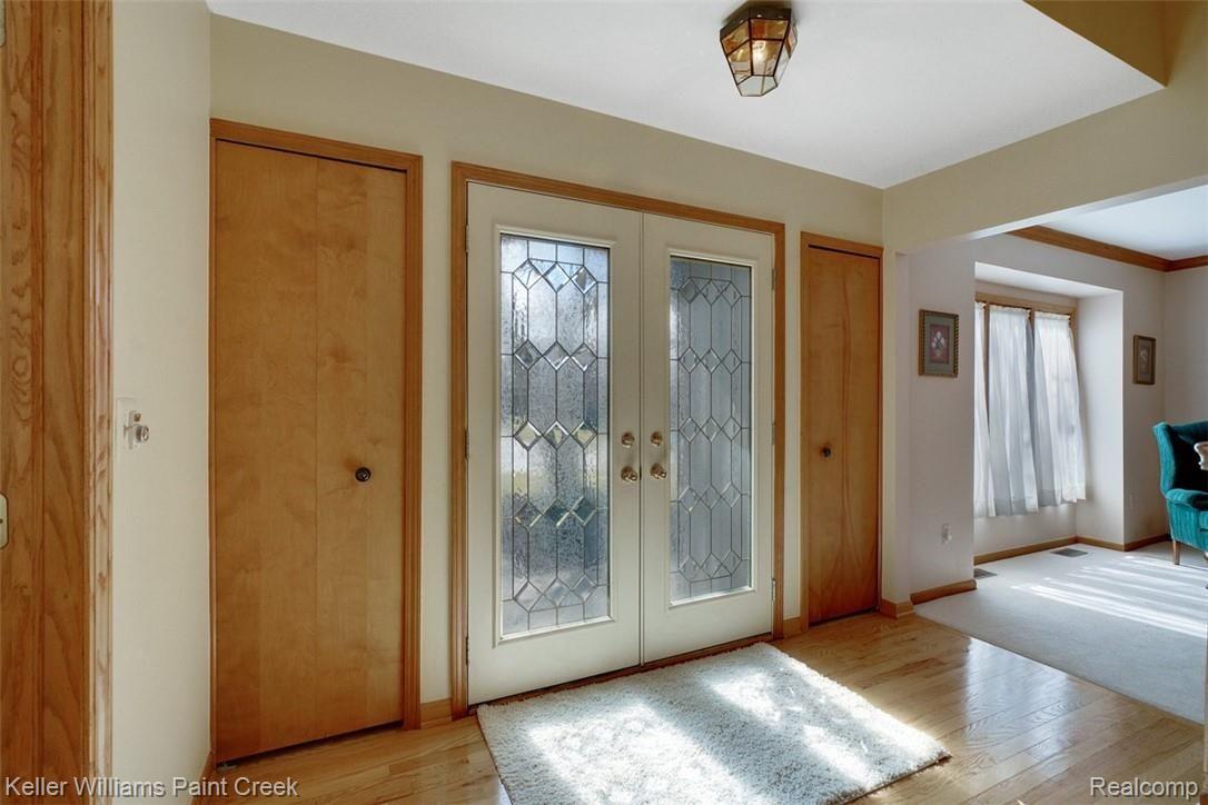 3098 Baypoint Drive Rochester, MI 48309 - Photo 9 of 32 Gorgeous double stained glass doors at the front entrance.