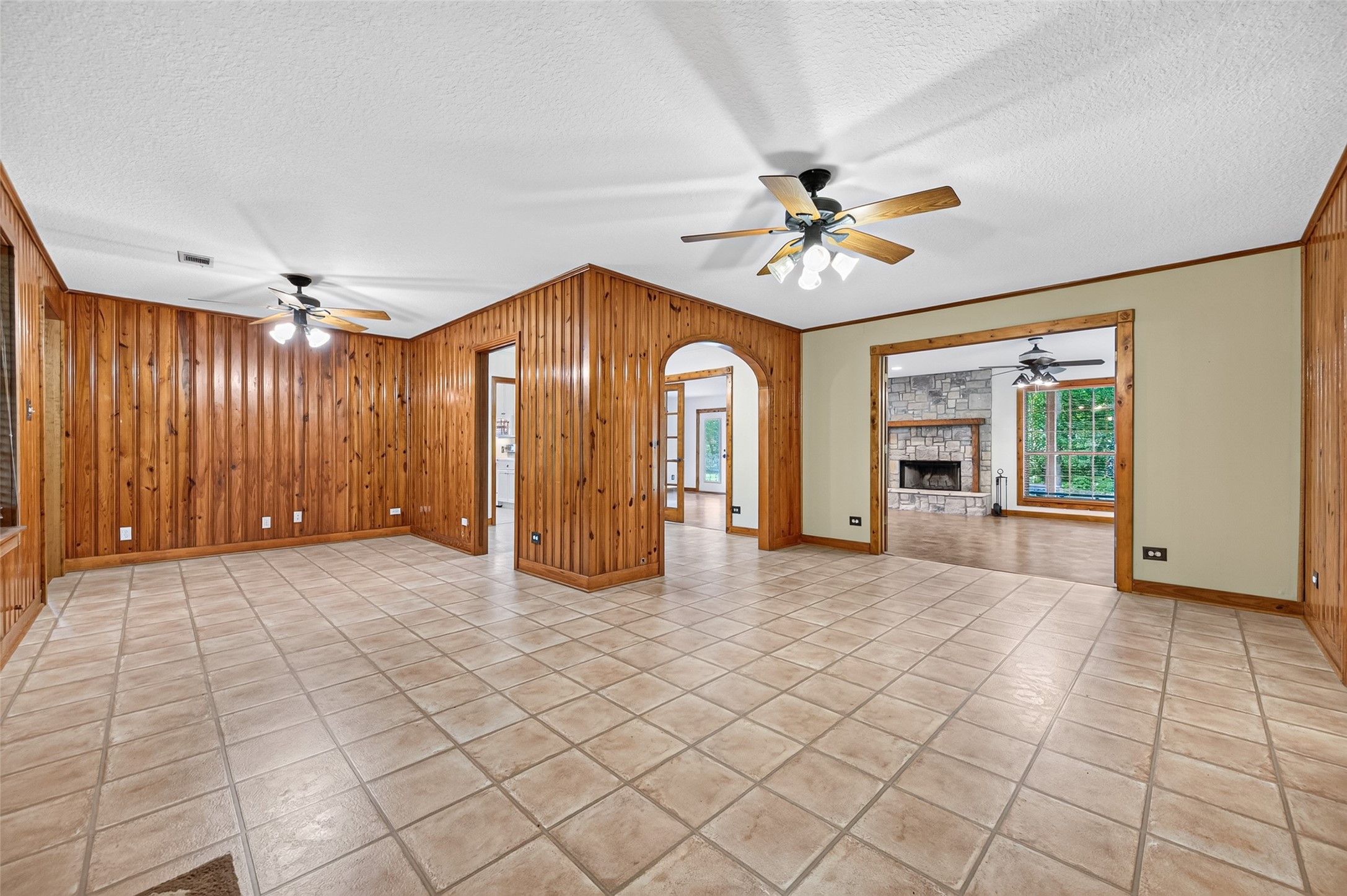 13996 Kidd Road Conroe, TX 77302 - Photo 5 of 46 From den area showing formal dining and the beautiful woodwork