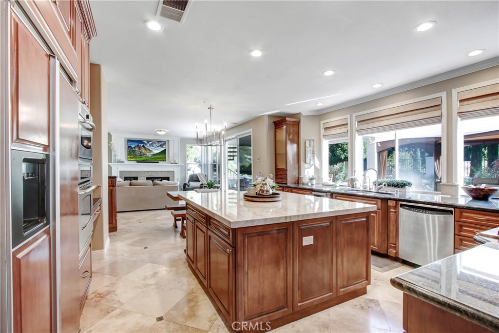 12036 Wood Ranch Road Granada Hills, CA 91344 - Photo 9 of 55 Built In Sub Zero Refrigerator