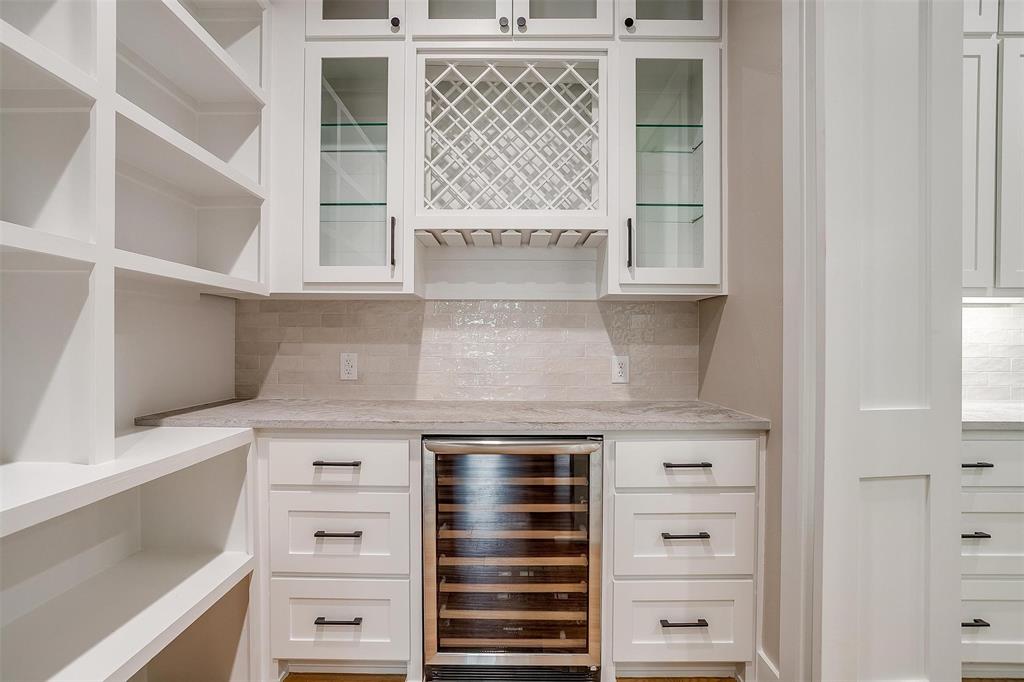 3019 Orchard Road Bowie, TX 76230 - Photo 19 of 40 a view of a kitchen with cabinets and window