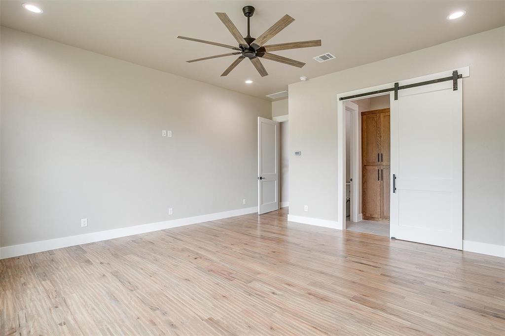 3019 Orchard Road Bowie, TX 76230 - Photo 22 of 40 wooden floor in an empty room