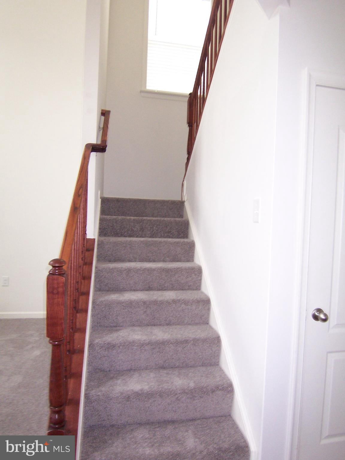 1231 North Fairfax Boulevard Ranson, WV 25438 - Photo 21 of 43 Staircase to Upper Level