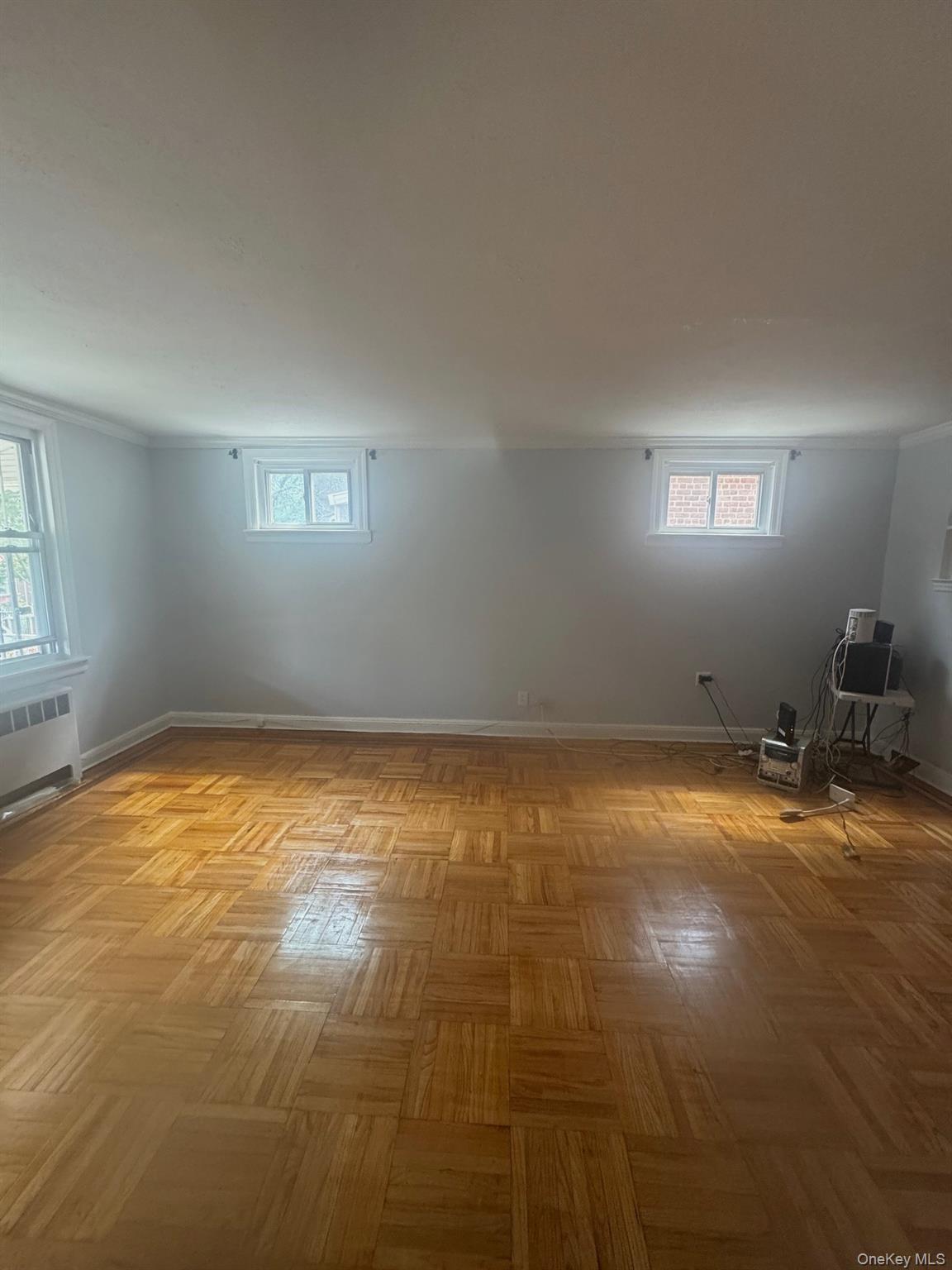 2339 Barnes Avenue Bronx, NY 10467 - Photo 13 of 16 an empty room with a window