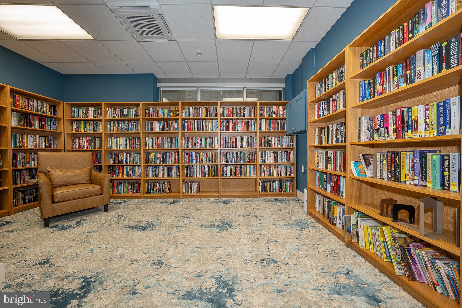 1919 Chestnut Street, Unit 1919 Philadelphia, PA 19103 - Photo 22 of 27 a view of livingroom with furniture and book shelf