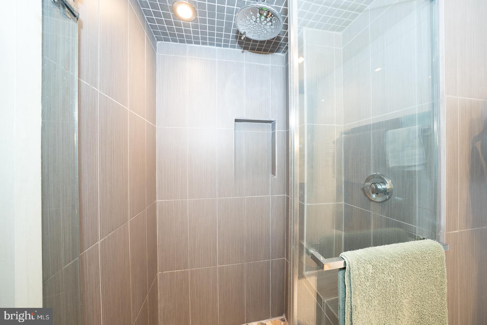 1919 Chestnut Street, Unit 1919 Philadelphia, PA 19103 - Photo 10 of 27 a bathroom with a shower