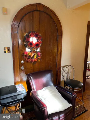 a room with furniture and lamp