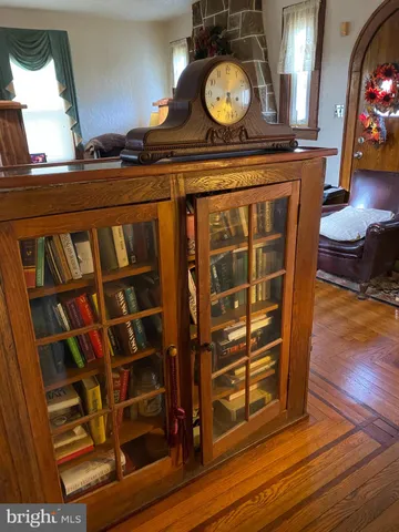 a view of a living room and wooden floor