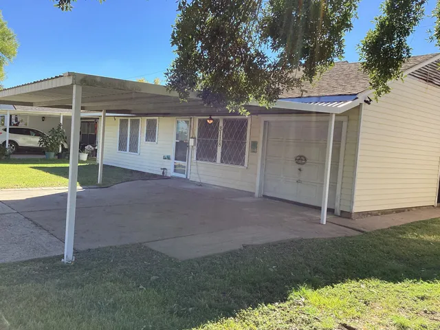 a view of a living room with a large window