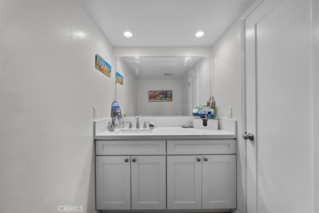28178 Ridgecove Court South Rancho Palos Verdes, CA 90275 - Photo 14 of 45 a bathroom with a sink vanity and mirror