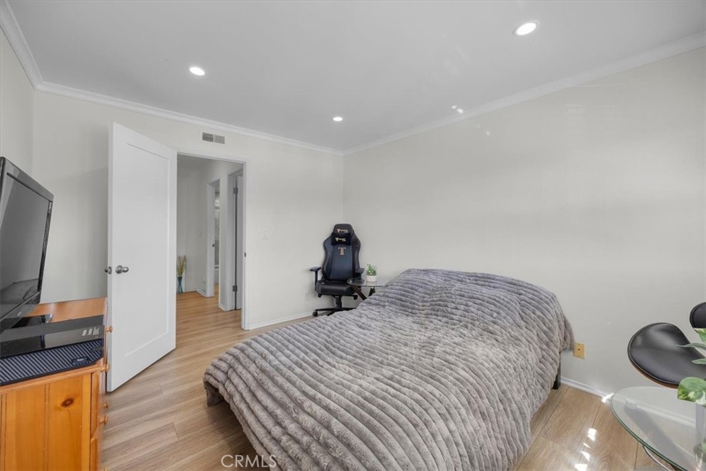 28178 Ridgecove Court South Rancho Palos Verdes, CA 90275 - Photo 17 of 45 a bedroom with a bed and a flat screen tv