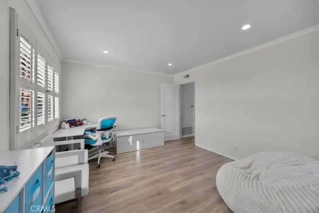 a room with furniture and a wooden floor