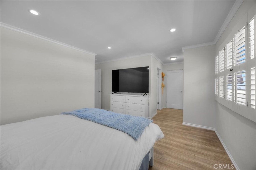 28178 Ridgecove Court South Rancho Palos Verdes, CA 90275 - Photo 23 of 45 a bedroom with a bed and a flat screen tv