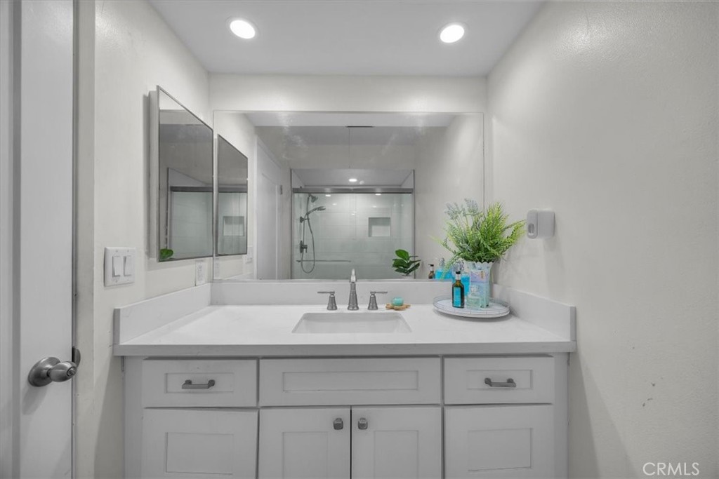 28178 Ridgecove Court South Rancho Palos Verdes, CA 90275 - Photo 24 of 45 a bathroom with a sink and a mirror