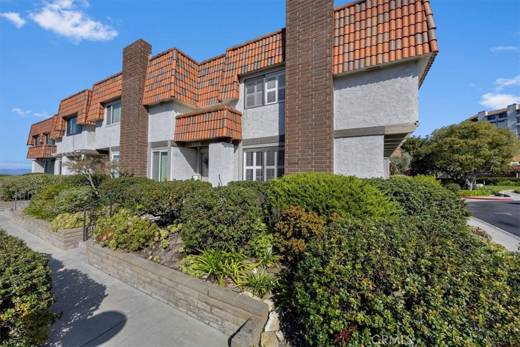 28178 Ridgecove Court South Rancho Palos Verdes, CA 90275 - Photo 35 of 45 a front view of a house with a garden