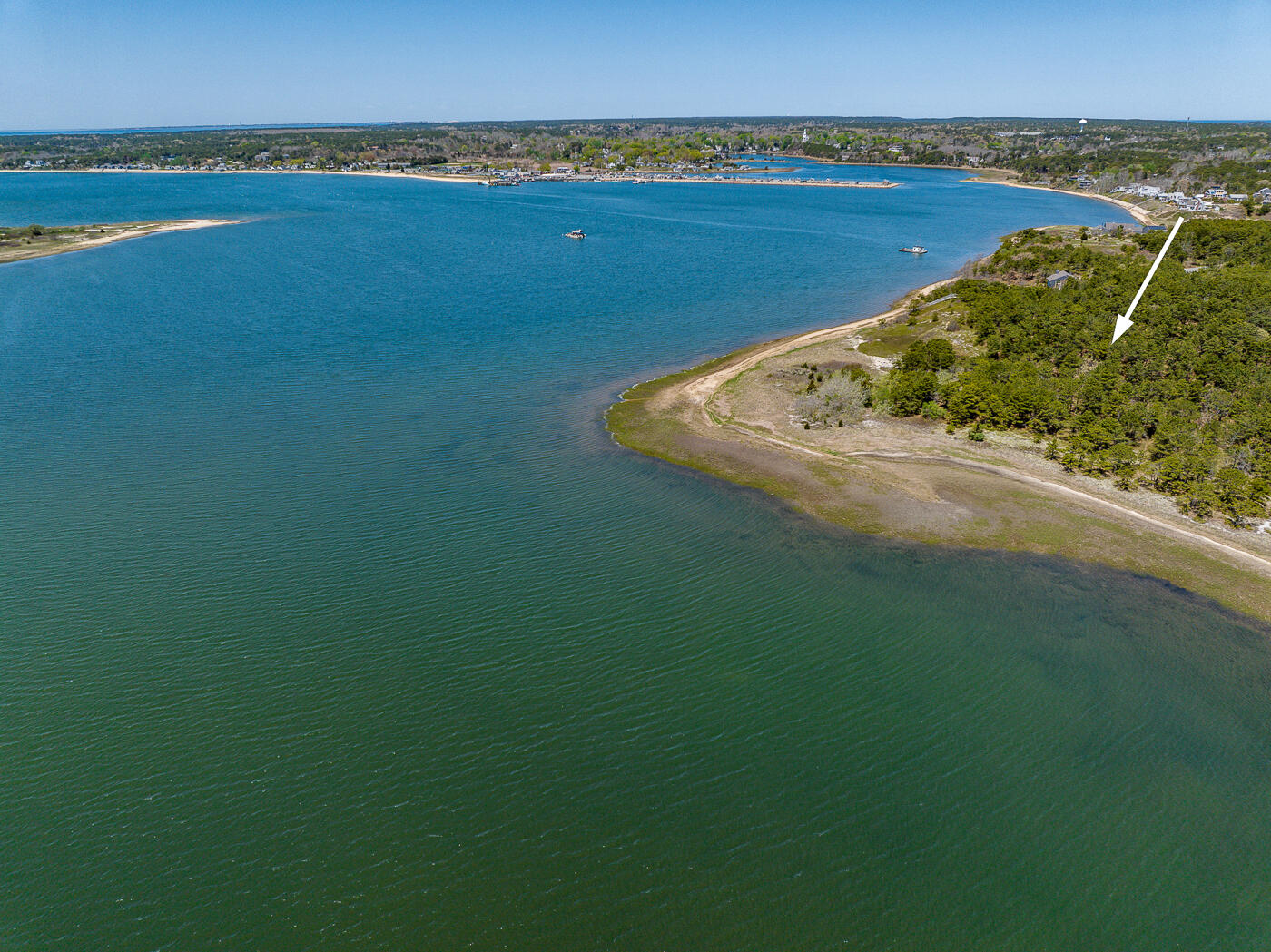 65 Belding Way Wellfleet, MA 02667 - Photo 2 of 12 a view of a lake with a mountain