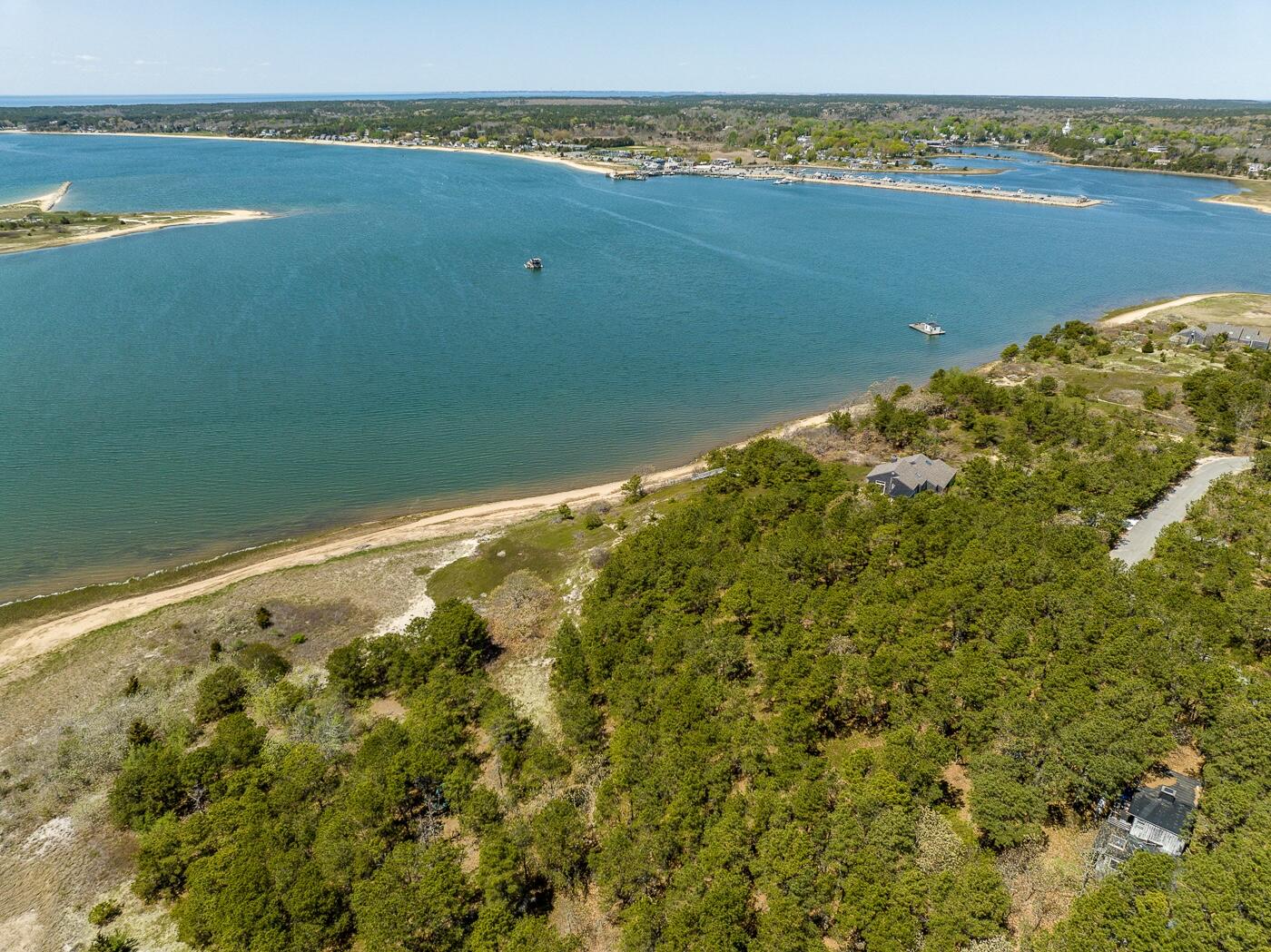 65 Belding Way Wellfleet, MA 02667 - Photo 4 of 12 a view of an ocean and a mountain