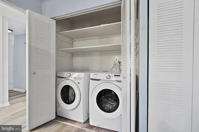 a utility room with dryer and washer