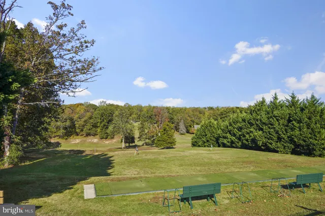 a view of a swimming pool and lake view