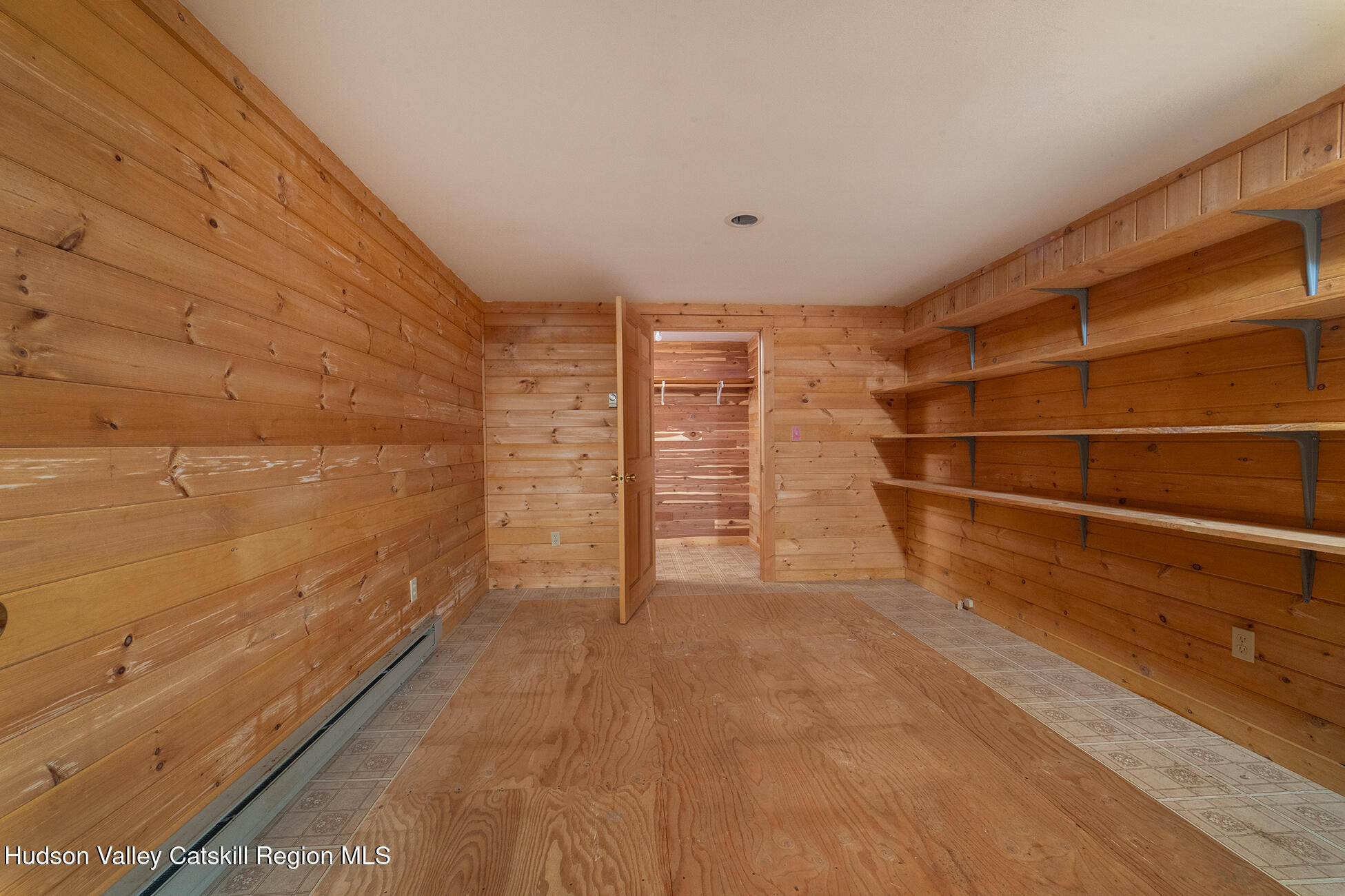 317 Mountain View Road Copake, NY 12516 - Photo 23 of 27 a view of walk in closet with empty racks
