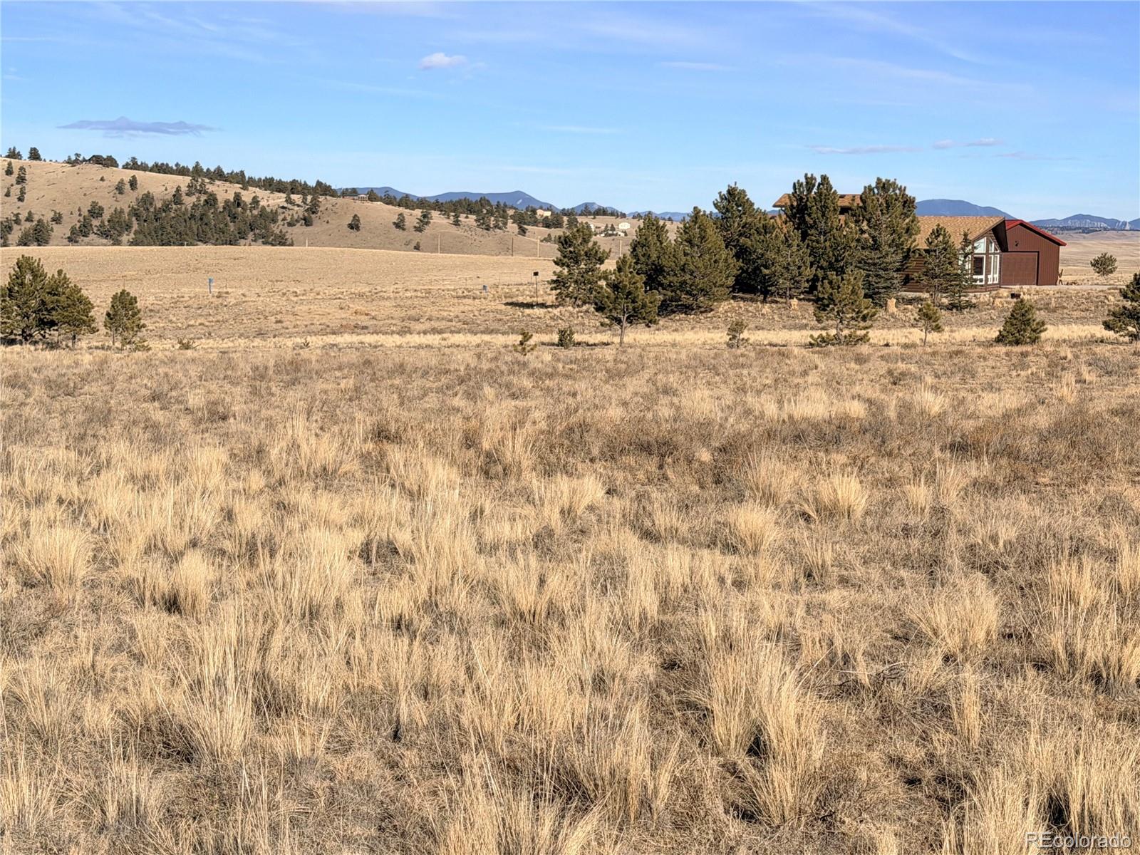 311 Harness Way Hartsel, CO 80449 - Photo 10 of 15 a view of a large body of water with a building in the background