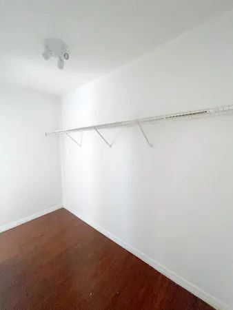 a view of a room with racks on the wall