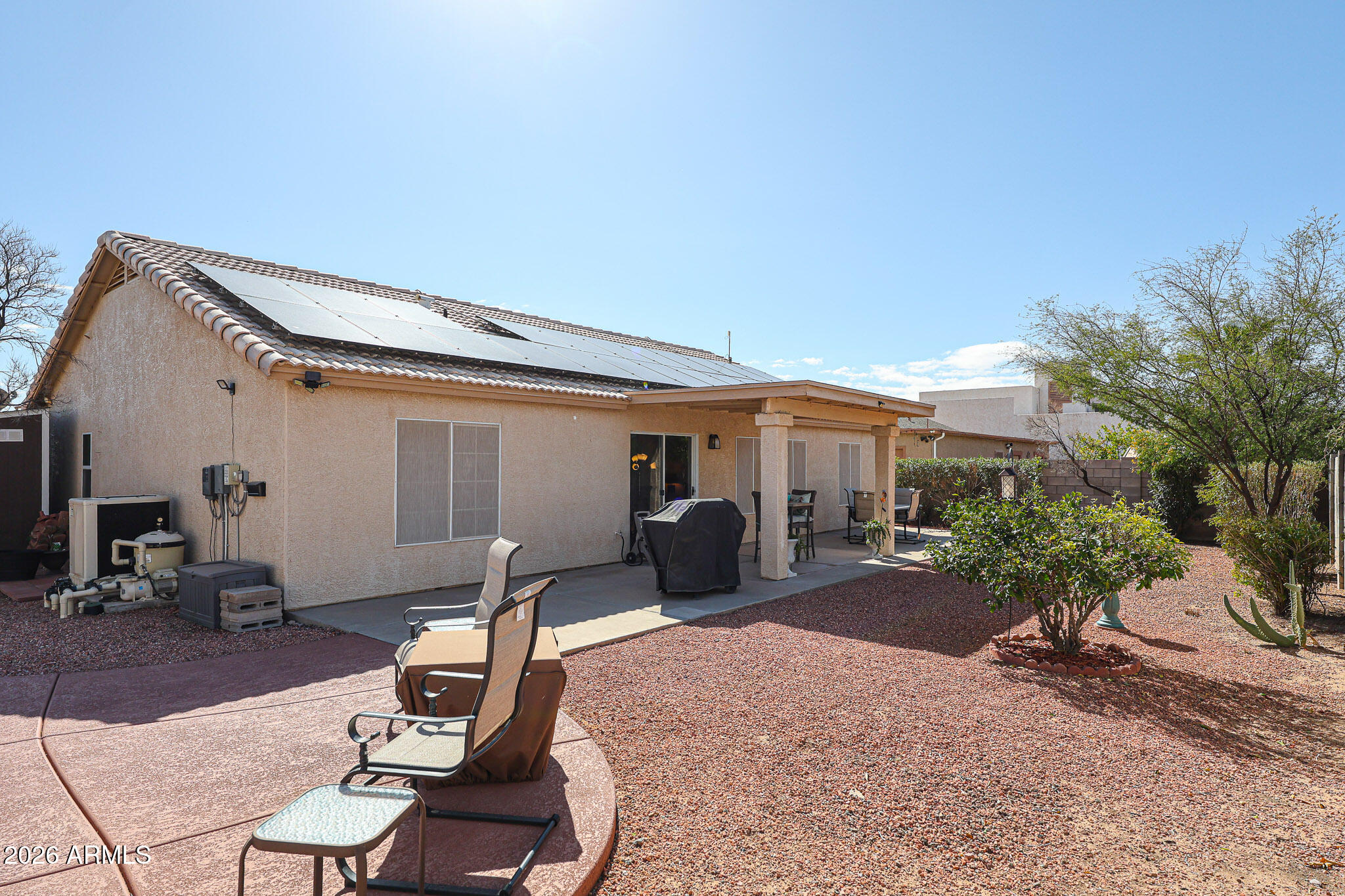 14980 South Capistrano Road Arizona City, AZ 85123 - Photo 29 of 39 a front view of a house with outdoor seating