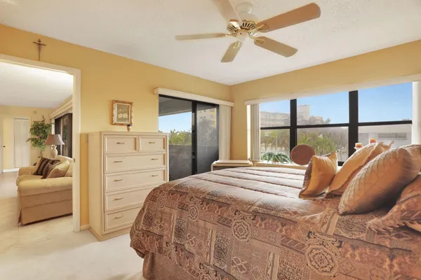 a bathroom with a shower and a sink