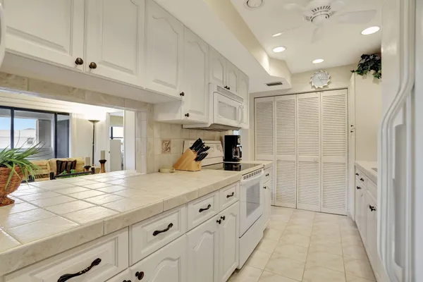 a view of a bathroom with a glass door shower