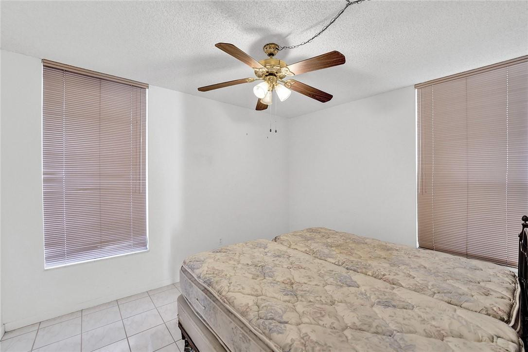 8401 West Sample Road, Unit 37 Coral Springs, FL 33065 - Photo 11 of 22 Bedroom on first floor.