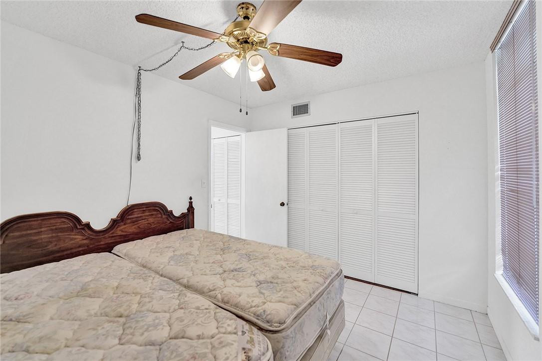 8401 West Sample Road, Unit 37 Coral Springs, FL 33065 - Photo 12 of 22 Downstairs bedroom.