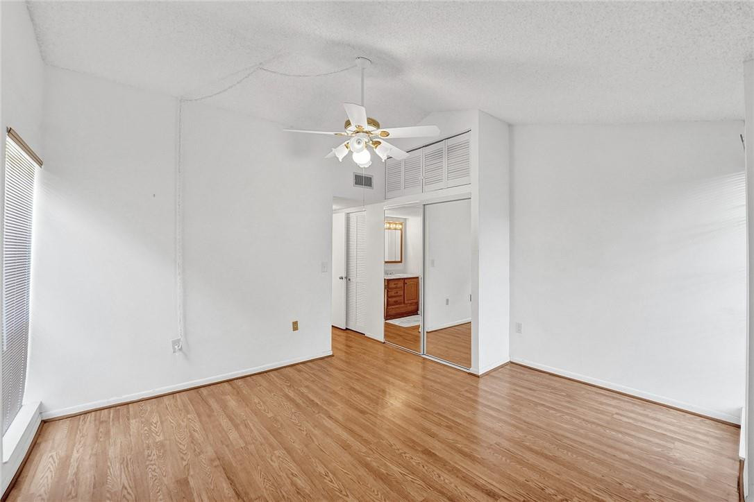 8401 West Sample Road, Unit 37 Coral Springs, FL 33065 - Photo 17 of 22 Master bedroom on second floor.
