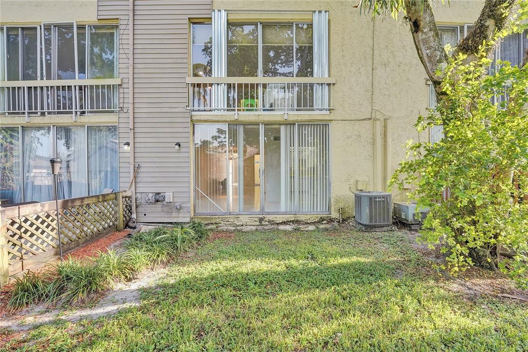 8401 West Sample Road, Unit 37 Coral Springs, FL 33065 - Photo 19 of 22 Private garden area.