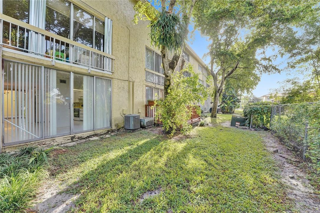 8401 West Sample Road, Unit 37 Coral Springs, FL 33065 - Photo 20 of 22 Backyard area.