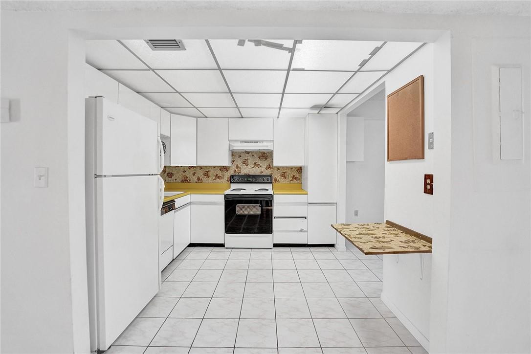 8401 West Sample Road, Unit 37 Coral Springs, FL 33065 - Photo 6 of 22 Kitchen