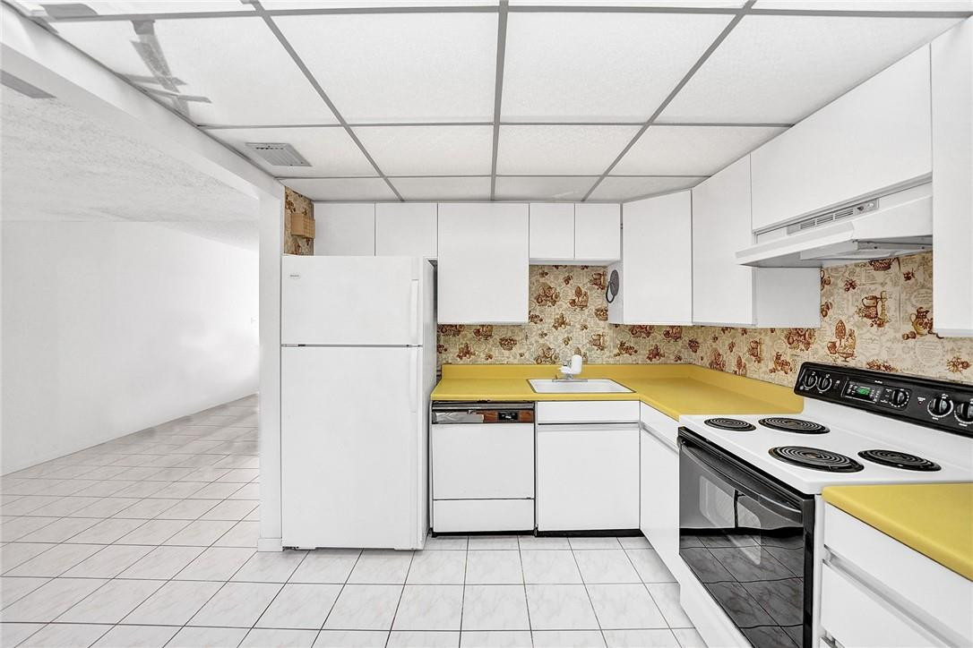 8401 West Sample Road, Unit 37 Coral Springs, FL 33065 - Photo 8 of 22 Kitchen
