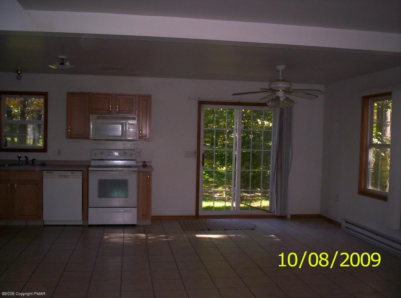 3312 Cotswald Road Tobyhanna, PA 18466 - Photo 3 of 9 a view of an empty room with a window