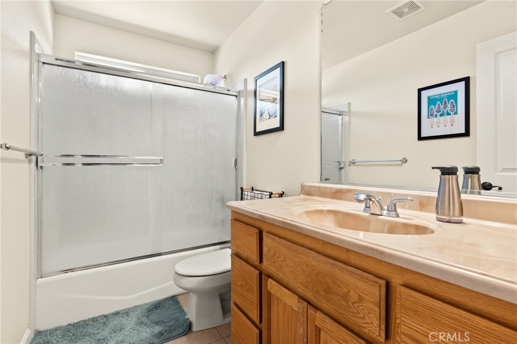 38 Kobe Loop Chico, CA 95973 - Photo 29 of 38 a bathroom with a granite countertop sink toilet and shower