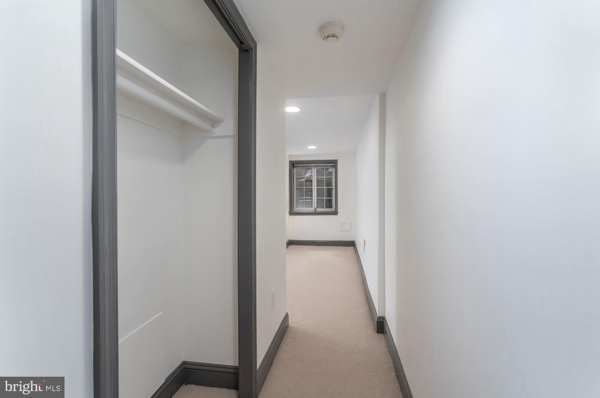 3267 N Street Northwest, Unit 2 Washington, DC 20007 - Photo 16 of 21 a view of a hallway with wooden floor