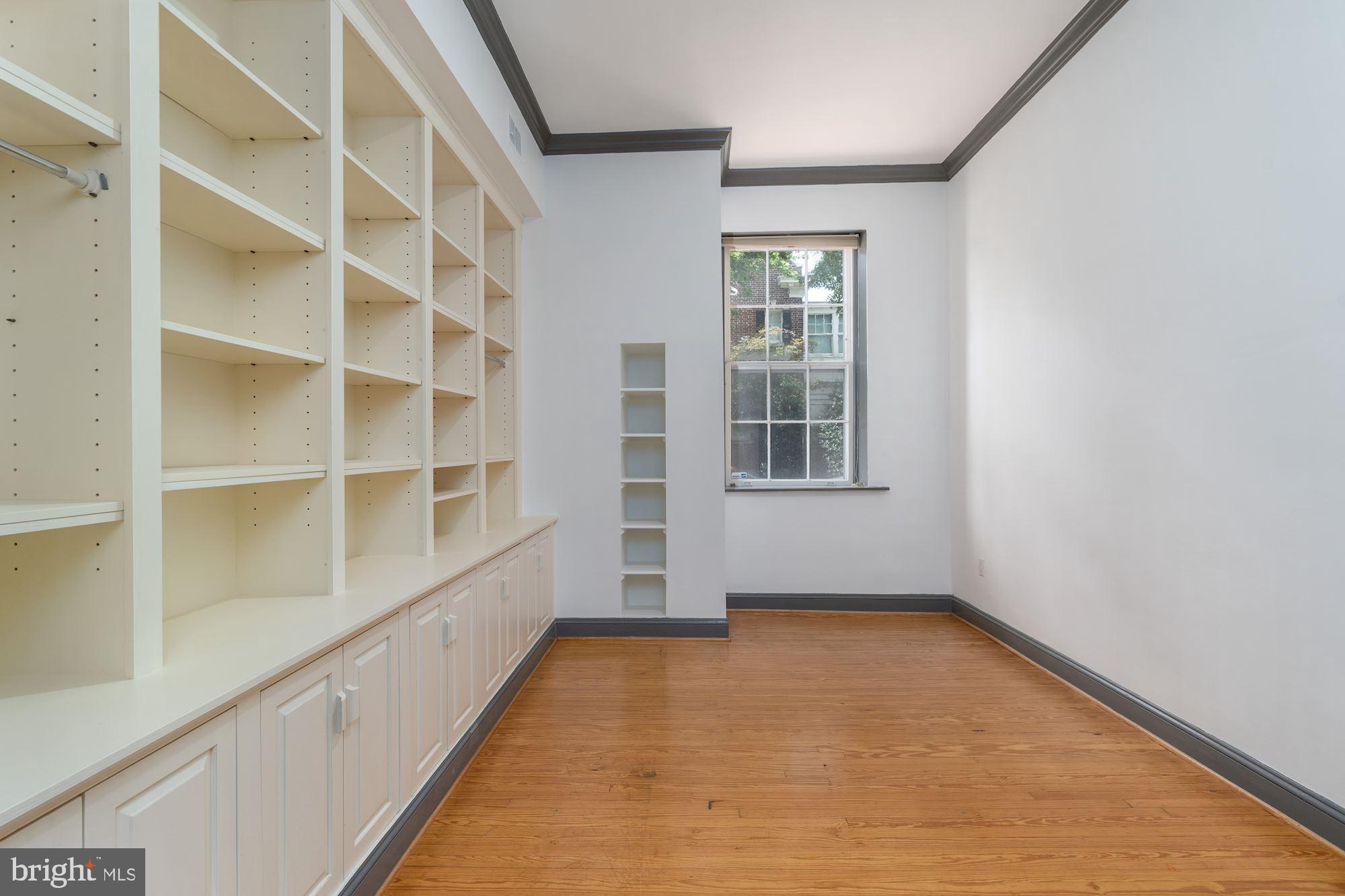 3267 N Street Northwest, Unit 2 Washington, DC 20007 - Photo 8 of 21 a view of an empty room with a window