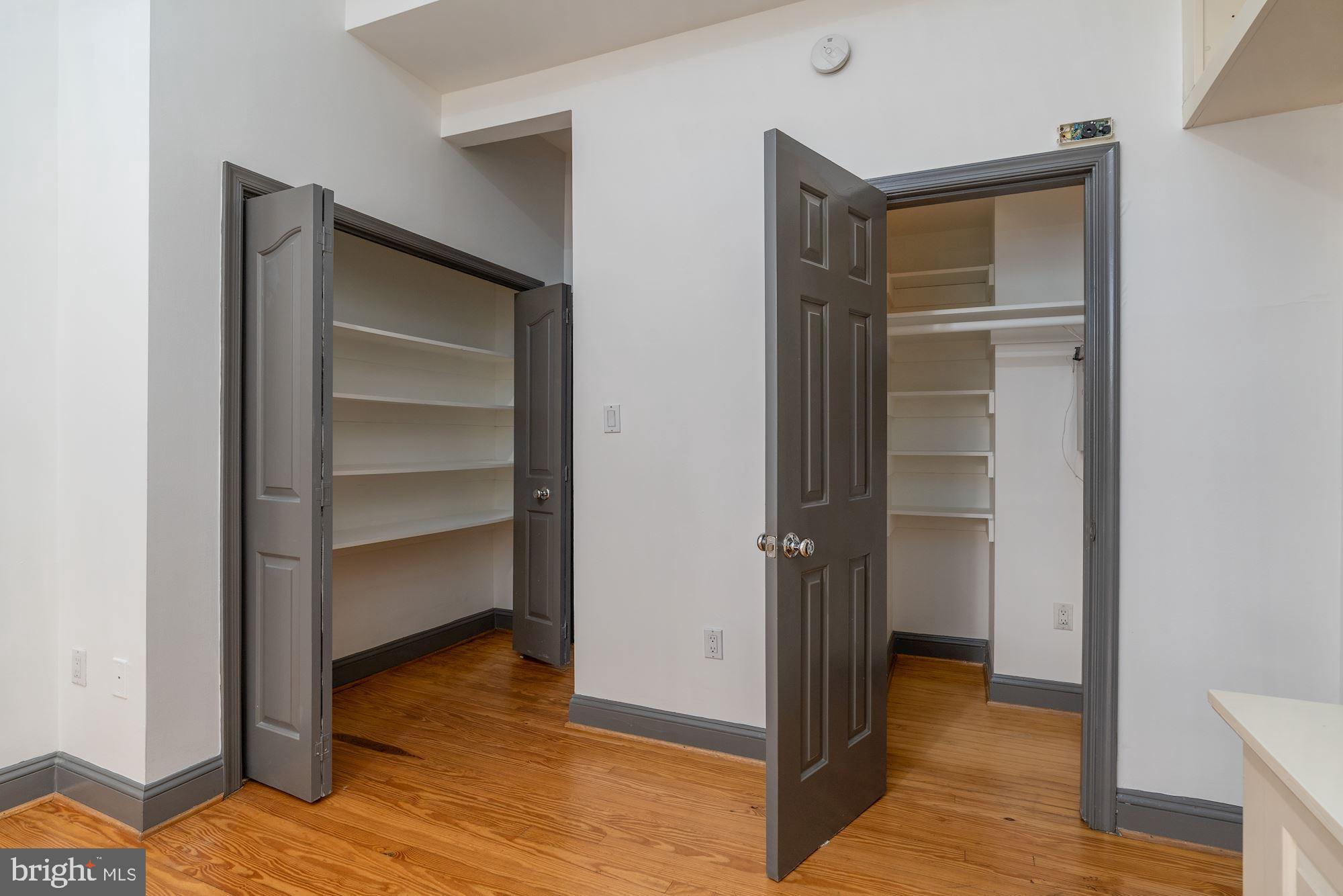 3267 N Street Northwest, Unit 2 Washington, DC 20007 - Photo 10 of 21 a view of walk in closet with empty racks