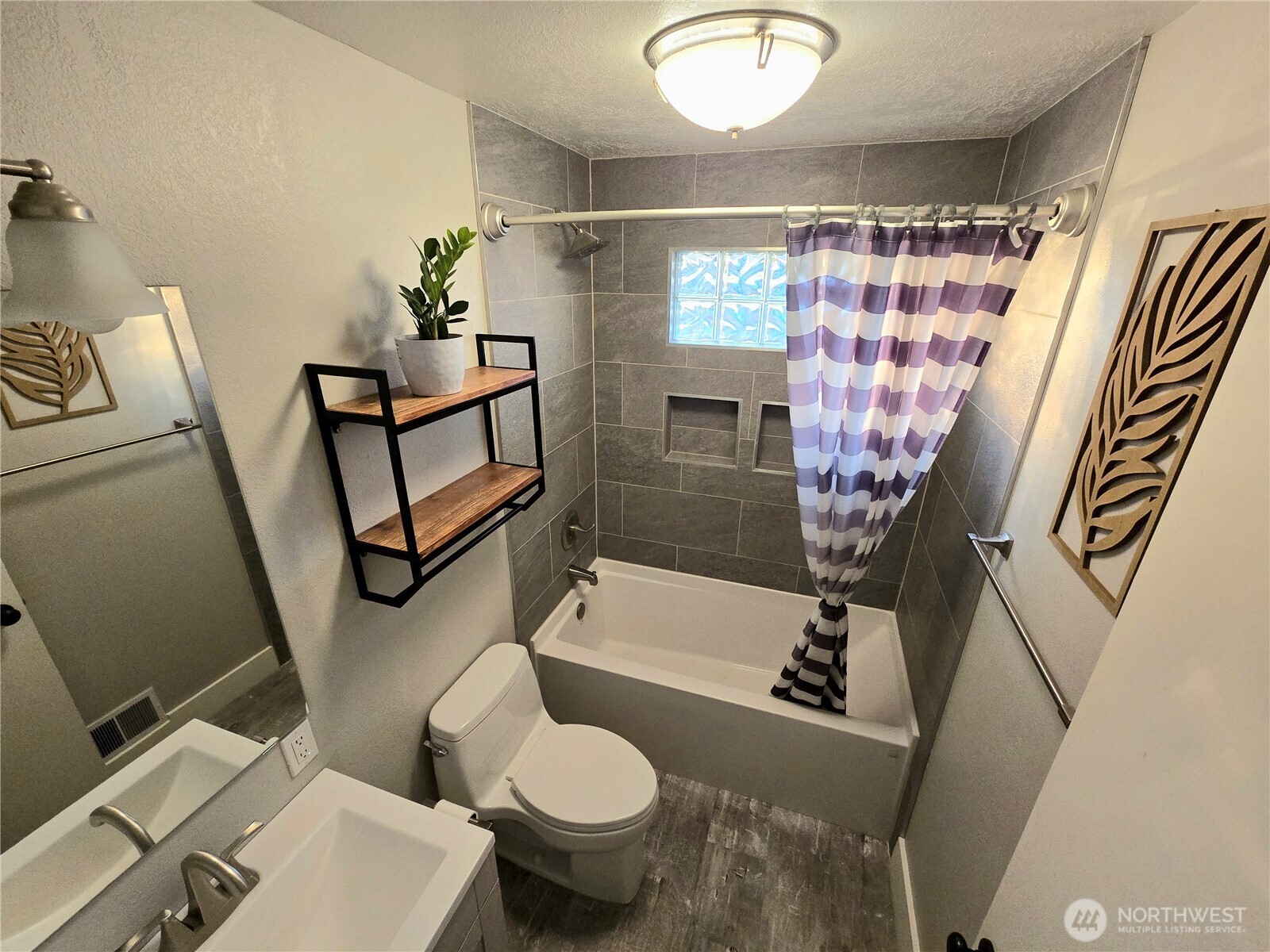 503 Clay Street Walla Walla, WA 99362 - Photo 16 of 21 a bathroom with a sink toilet and shower