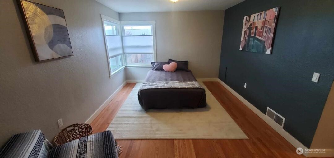 503 Clay Street Walla Walla, WA 99362 - Photo 19 of 21 a bedroom with a bed and window