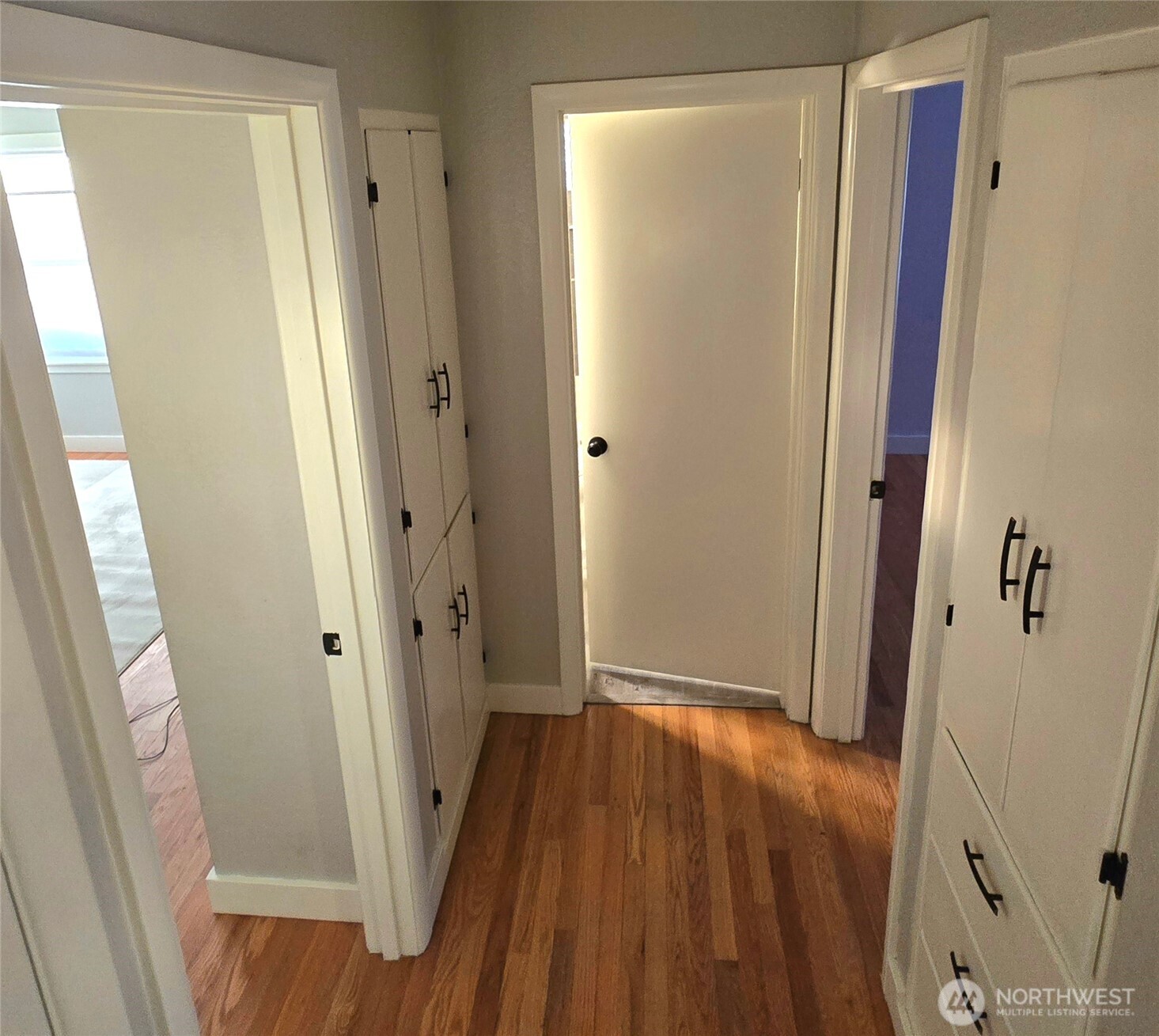503 Clay Street Walla Walla, WA 99362 - Photo 3 of 21 a view of a hallway with wooden floor and staircase