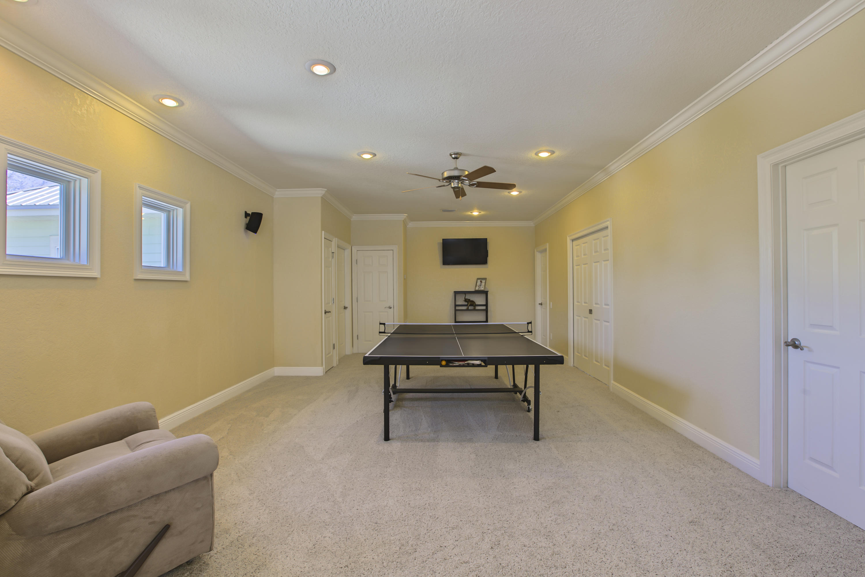 218 Buck Road Santa Rosa Beach, FL 32459 - Photo 16 of 25 a bedroom with furniture and a air conditioner vent