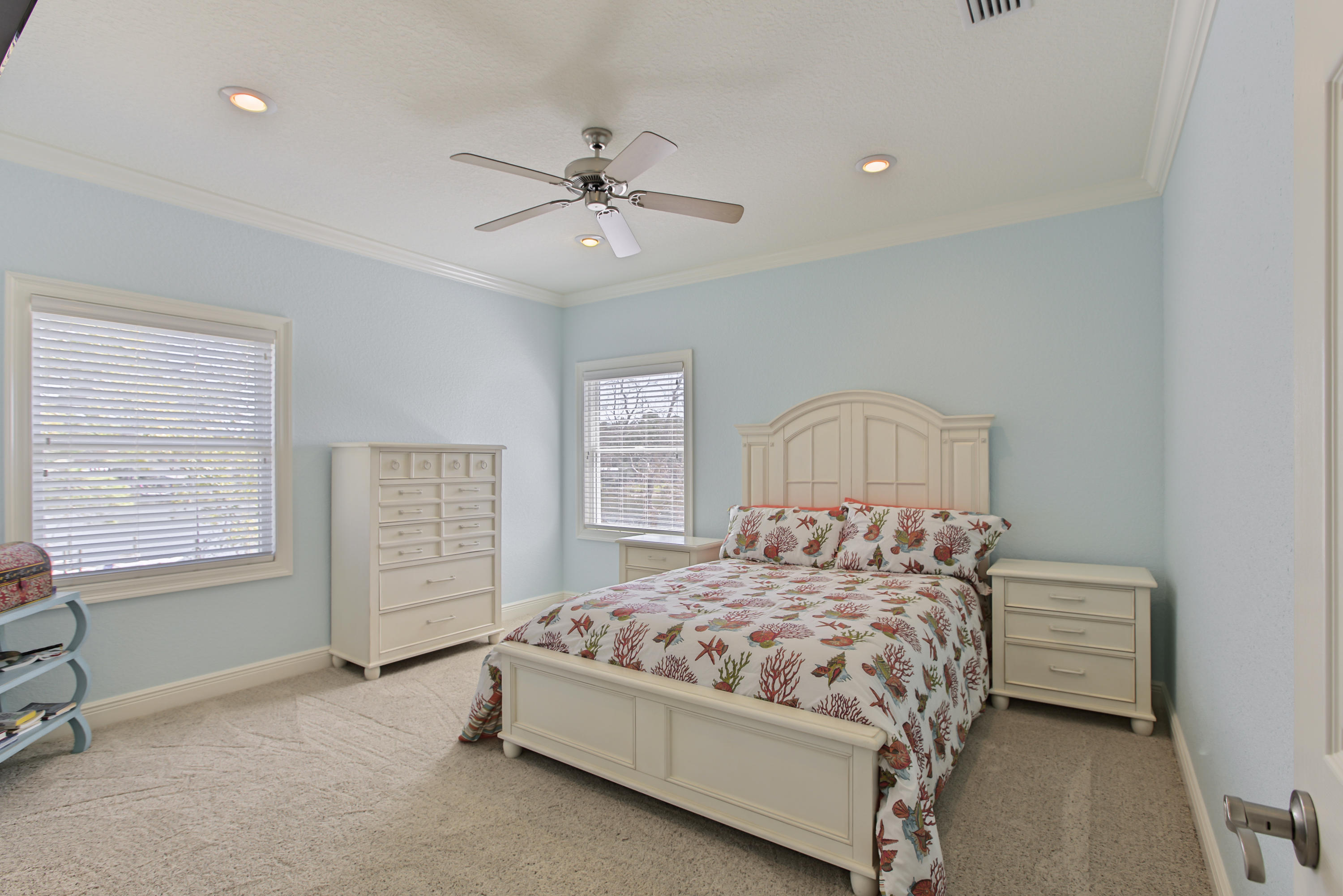 218 Buck Road Santa Rosa Beach, FL 32459 - Photo 17 of 25 a bedroom with a bed next to a window