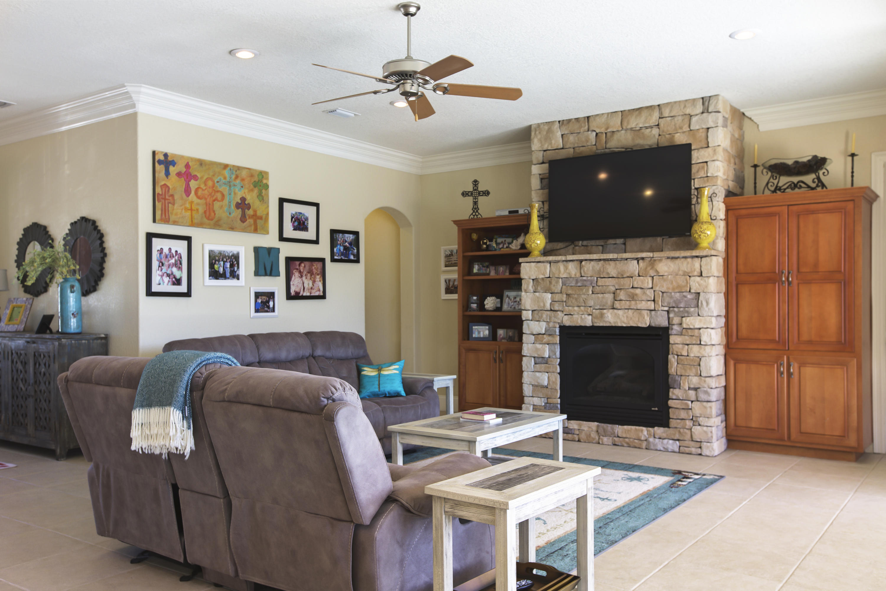 218 Buck Road Santa Rosa Beach, FL 32459 - Photo 24 of 25 a living room with furniture and a fireplace